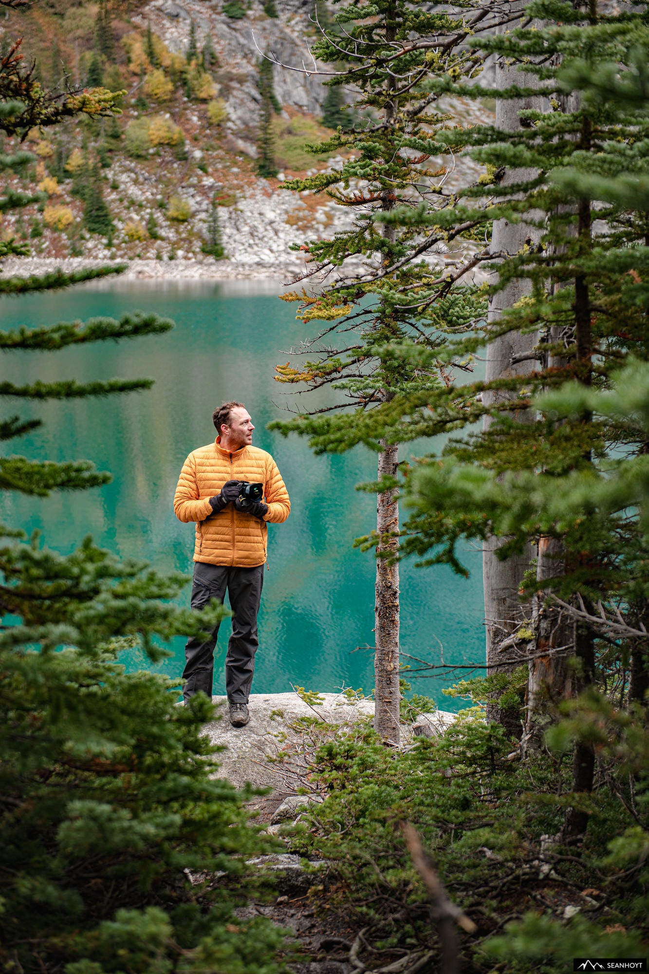 Sean Hoyt at a lake with camera