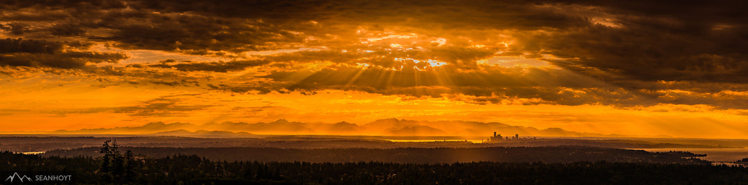 Golden Light above Seattle and Olympic Mountains